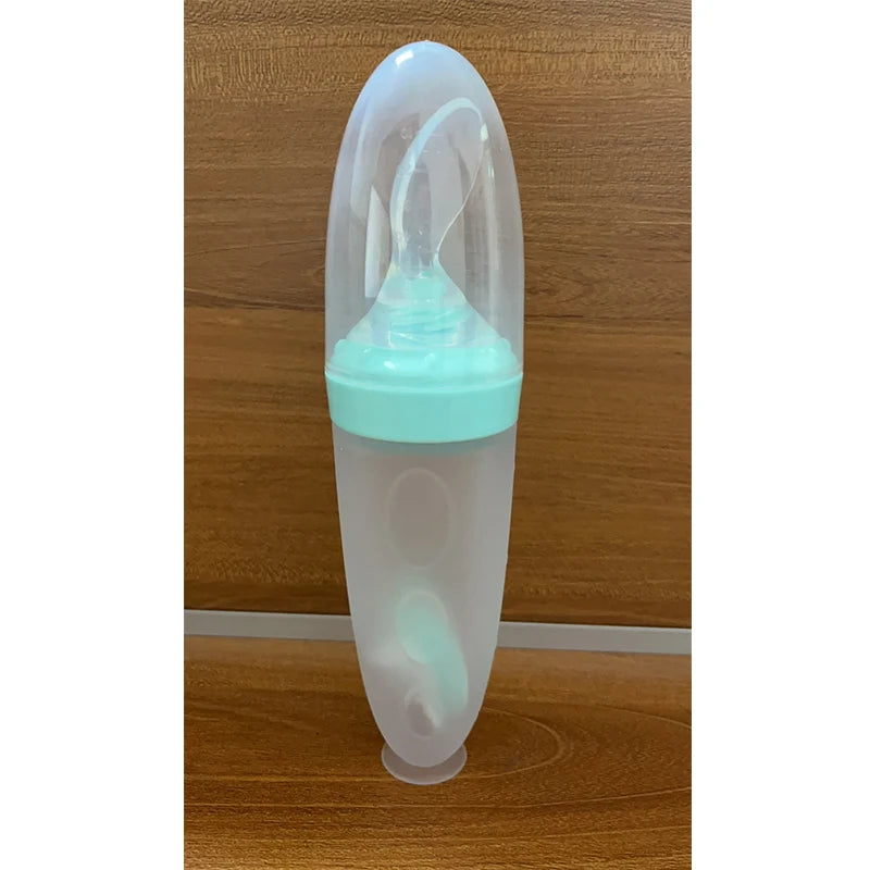 Depressible Silicone Baby Feeding Spoon & Bottle